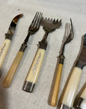 Collection of Silver and White Plastic Serving Utensils- Set of 7