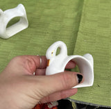 Pair of White Ceramic Swan Napkin Rings