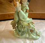 Small Detailed Ceramic Asian Figurine With Gold Accents
