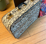 Animal Print Suitcase With Gold Accents