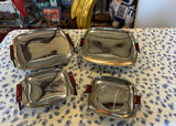 Collection of Four Nesting Bake Light, Silver MCM Footed Trays