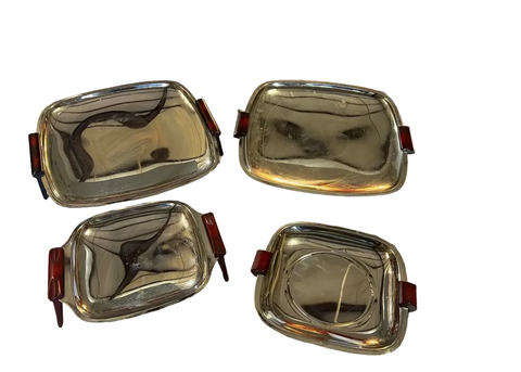 Collection of Four Nesting Bake Light, Silver MCM Footed Trays