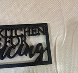 Black Cast Iron Kitchen Decor and Trivet