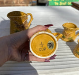Collection of Yellow Ceramic Measuring Cups With Eagle Accents- Set of 6