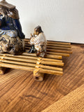 Collection of Asian Ceramic Figures and Wooden Stands