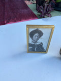 Pair of Gold Frames With Matching Photos