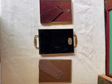 Trio of Gold Frames With Handles