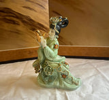 Small Detailed Ceramic Asian Figurine With Gold Accents