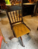 Antique Bankers Chair With Nail Head Trim and Wheels