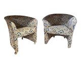 Pair of Fun Design Covered Tan Chairs on Wheels- Missing 1 Wheel