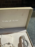 Cote D Azue Collection of Pearl Necklace, Earrings, and Watch