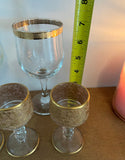 Collection of Glasses With Brass Details