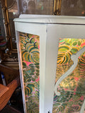 Vintage White Wooden Short Light Up Glass Display Cabinet With Tropical Wallpaper Background