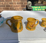 Collection of Yellow Ceramic Measuring Cups With Eagle Accents- Set of 6