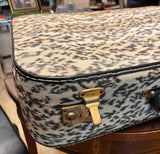 Animal Print Suitcase With Gold Accents