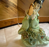Small Detailed Ceramic Asian Figurine With Gold Accents