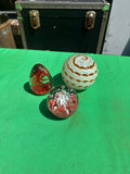 Collection of Orange and Red Glass Paperweights- Set of 3