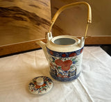Vintage Asian Style Ceramic Teapot With Wicker Handle