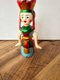 Small Moving Hand Painted Doll