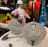 Pair of Round Hollywood Regency Crystal and Bronze Pendant Chandeliers