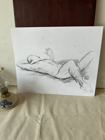 Front and Back Charcoal Drawing of a Man Lying Down