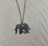 Silver Necklace With Elephant Pendant and Turquoise Stone Accent