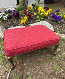 Red Covered Ottoman With Gold Legs