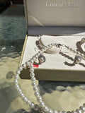 Cote D Azue Collection of Pearl Necklace, Earrings, and Watch