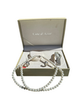 Cote D Azue Collection of Pearl Necklace, Earrings, and Watch