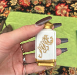 Pair of Ceramic Salt and Pepper Shakers With Gold Accents