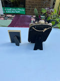 Pair of Gold Frames With Matching Photos