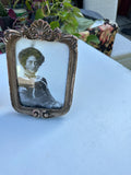Pair of Gold Frames With Matching Photos