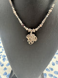 Flower Pendant Silver Necklace With Heart Beads