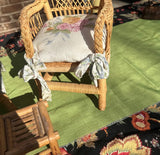 Pair of Miniature Wicker Chairs With Floral Cushions and Matching Ottoman