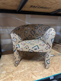 Pair of Fun Design Covered Tan Chairs on Wheels- Missing 1 Wheel