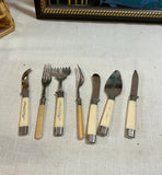 Collection of Silver and White Plastic Serving Utensils- Set of 7