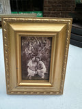 Pair of Small Gold Picture Frames With Family Photo Prints