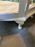 Vintage White Wooden Short Light Up Glass Display Cabinet With Tropical Wallpaper Background