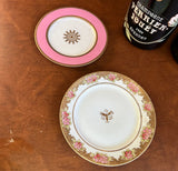 Pair of Pink and White Ceramic Plates
