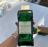 Collection of Green Glass Avon Bottle Cars- Set of 3