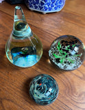 Trio of Green and Blue Glass Paperweights