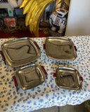 Collection of Four Nesting Bake Light, Silver MCM Footed Trays