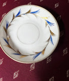 Small 1970s Blue and Gold Rimmed Ceramic Saucer