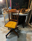 Antique Bankers Chair With Nail Head Trim and Wheels