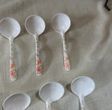 Collection of White Floral Plastic Soup Spoons- Set of 17