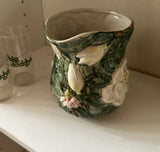 1970s Mid-Century Ceramic Green Pitcher With White Flower Accents