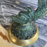 Antique 1940s Brass Dolphin Candle Holder. Located brasss
