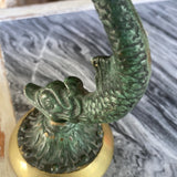 Antique 1940s Brass Dolphin Candle Holder. Located brasss